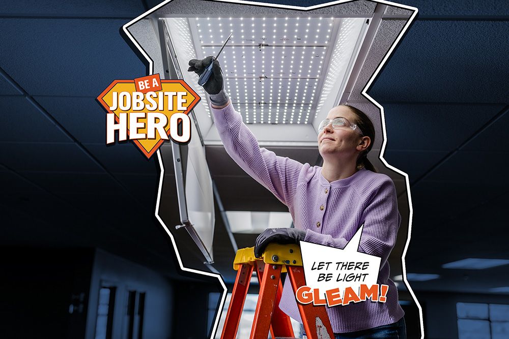 project manager coordinating commercial lighting installation on a jobsite