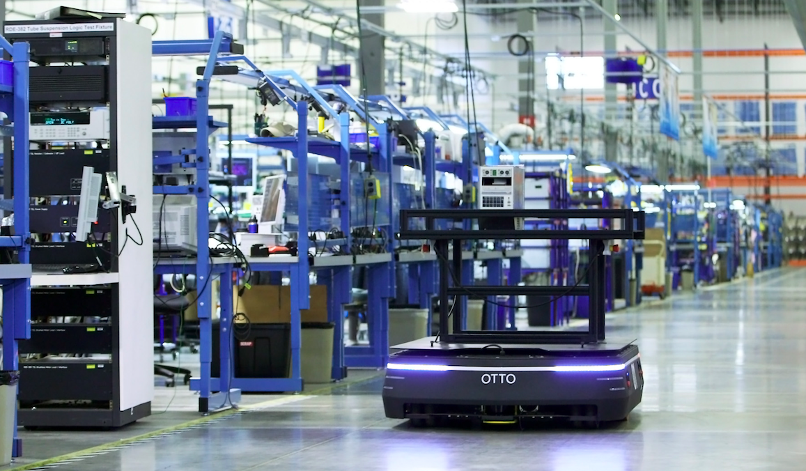 Autonomous mobile robot operating on a manufacturing floor